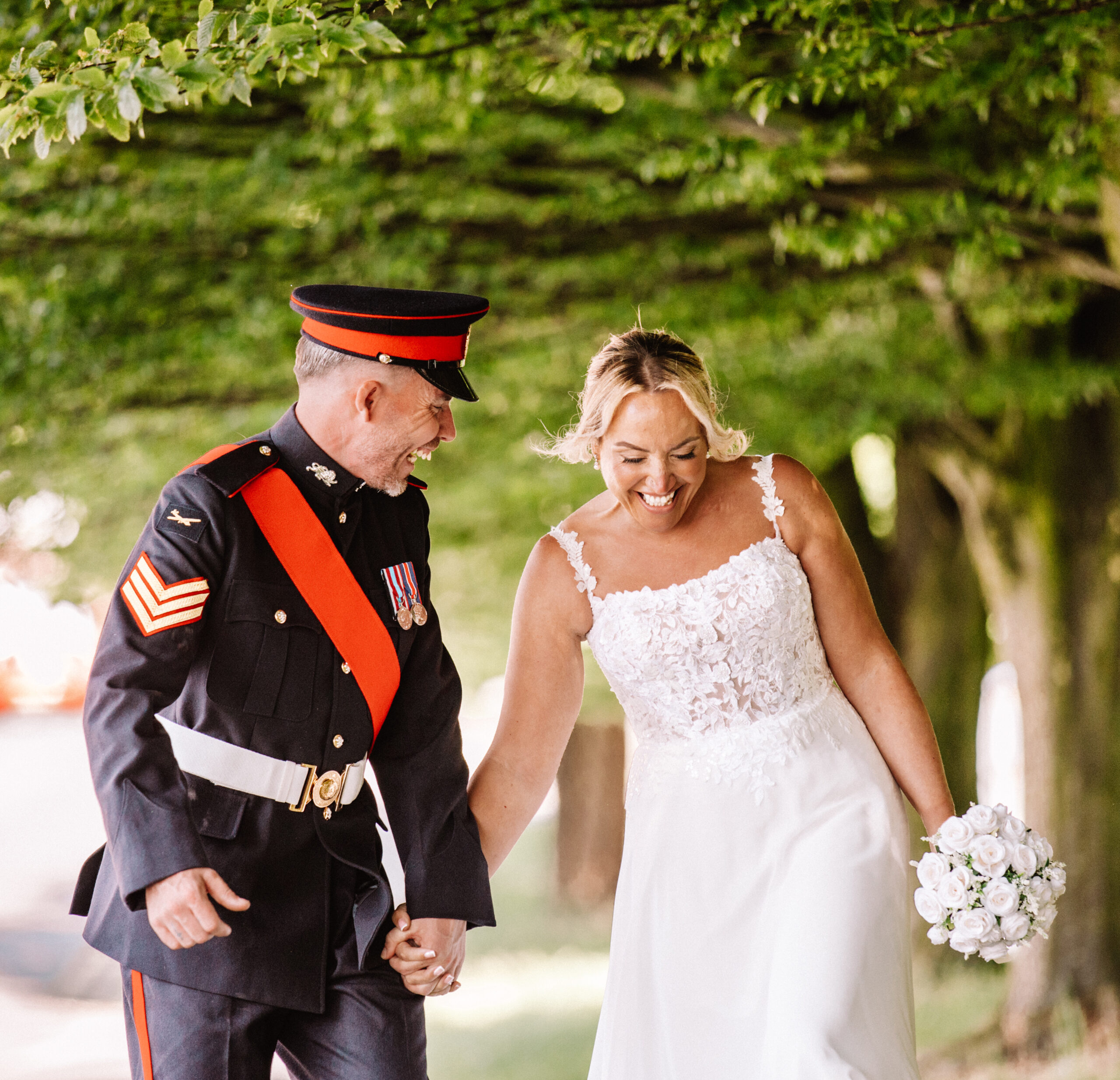 Bride & Groom holding hands